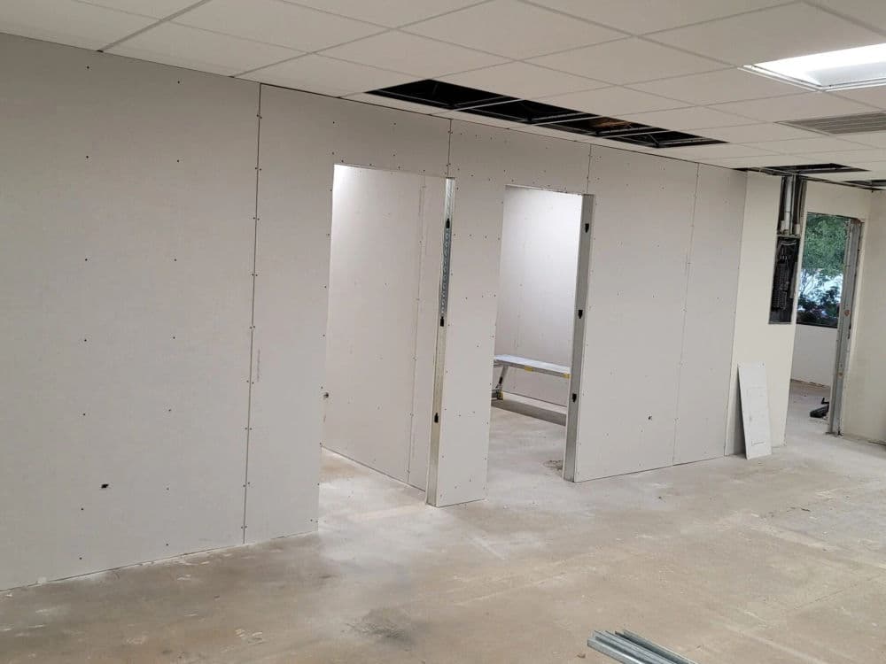 Office Interior Renovation with Glass Partition Installation